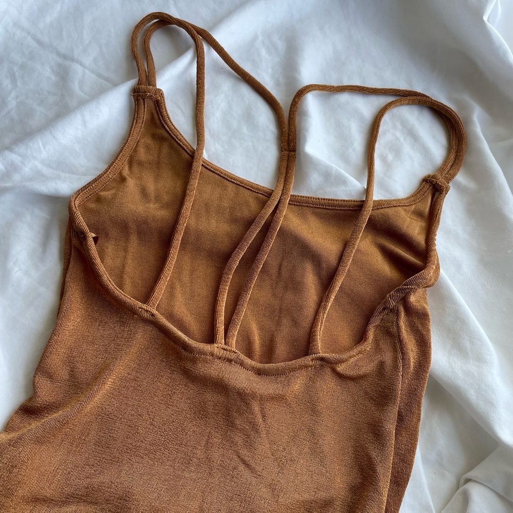 burnt orange body suit